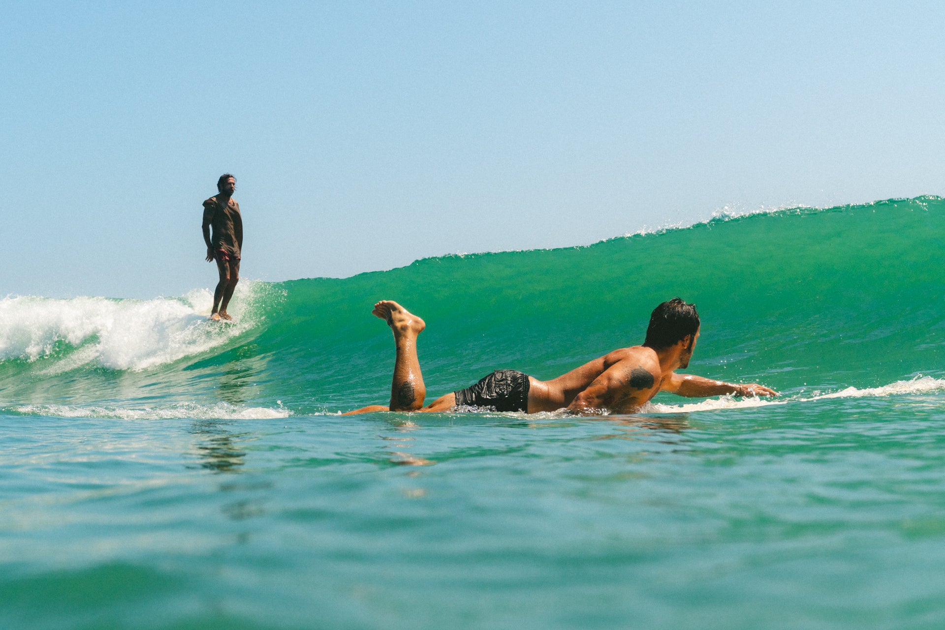 two surfers perfect wave in indonesia, longboard hang 10